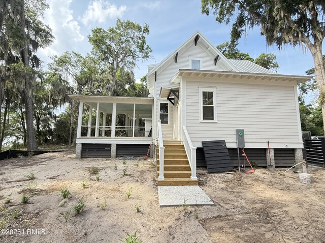 1185 Brotherhood Way, Beaufort, SC 29902 - rear view of property featuring a sunroom and metal roof