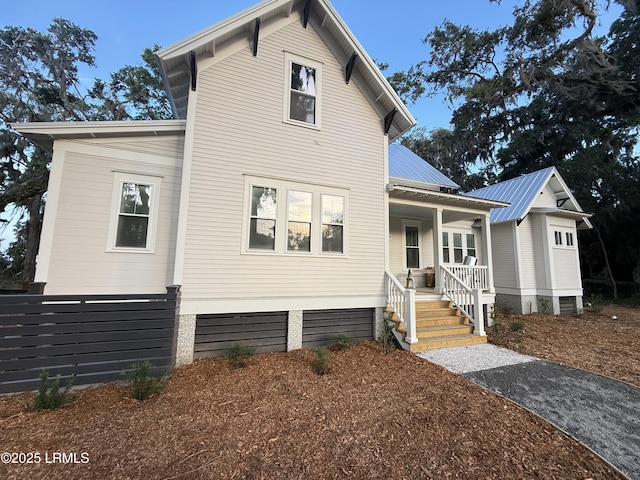 1185 Brotherhood Way, Beaufort, SC 29902 - view of front of property featuring a porch and metal roof