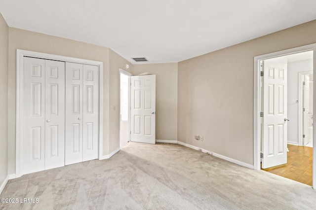 13 Annabella Ln, Hilton Head Island, SC 29926 - unfurnished bedroom with carpet flooring, baseboards, and a closet