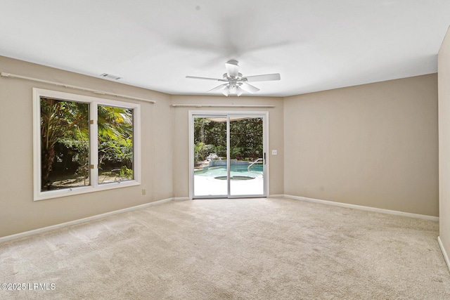 13 Annabella Ln, Hilton Head Island, SC 29926 - carpeted spare room featuring ceiling fan and baseboards