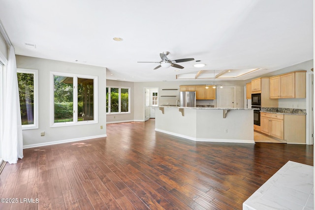13 Annabella Ln, Hilton Head Island, SC 29926 - unfurnished living room with a ceiling fan, baseboards, dark wood finished floors, attic access, and recessed lighting