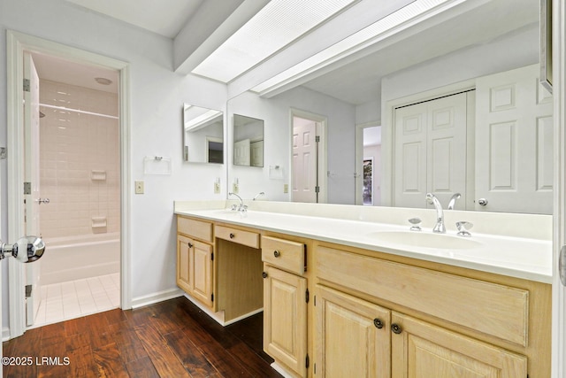 13 Annabella Ln, Hilton Head Island, SC 29926 - full bath with double vanity, wood finished floors, bathtub / shower combination, and baseboards