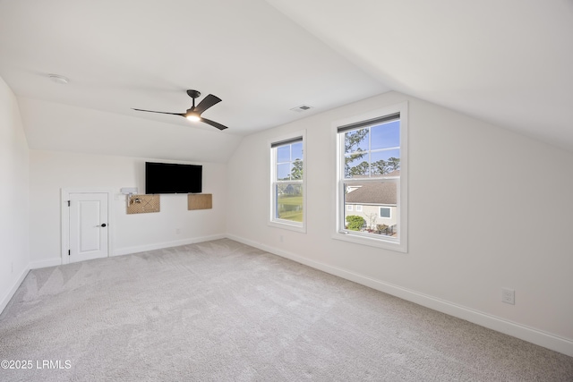 9 Daffodil Farm Way, Bluffton, SC 29910 - additional living space featuring vaulted ceiling, baseboards, ceiling fan, and carpet flooring