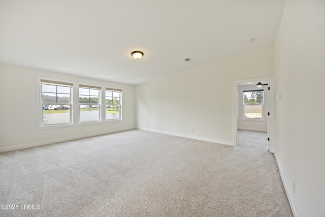 9 Daffodil Farm Way, Bluffton, SC 29910 - spare room featuring light colored carpet and baseboards