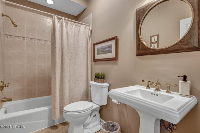 3 Longwood Ct, Okatie, SC 29909 - bathroom featuring shower / bath combo, a sink, toilet, and tile patterned floors