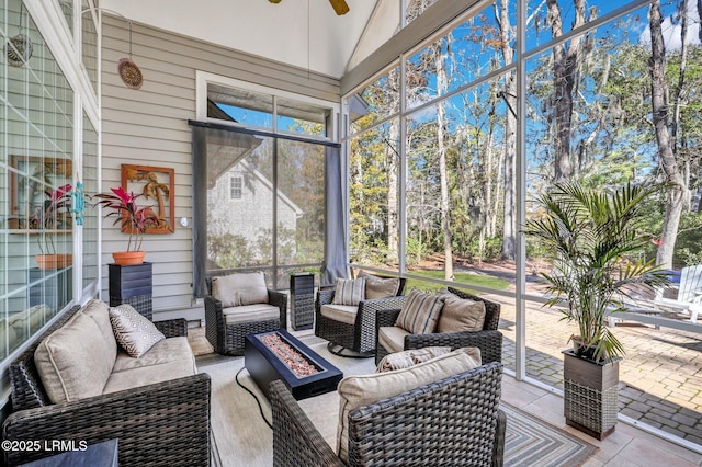 sunroom / solarium with ceiling fan