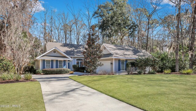 3 Longwood Ct, Okatie, SC 29909 - ranch-style home with a front yard, driveway, and a garage