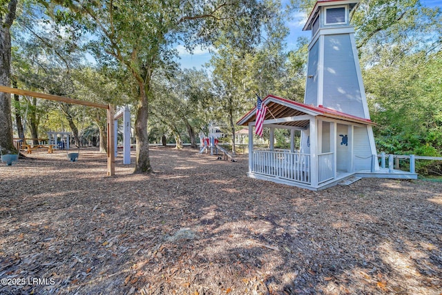 view of yard with a playground