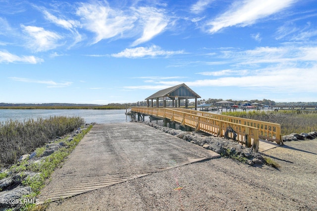 dock area featuring a gazebo and a water view