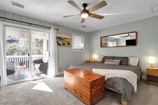 bedroom featuring ceiling fan, light colored carpet, and access to exterior