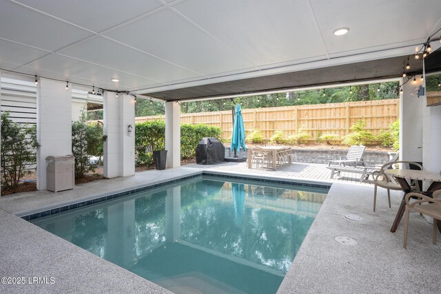 123 Sandcastle Ct, Hilton Head Island, SC 29928 - view of swimming pool with a patio and a grill