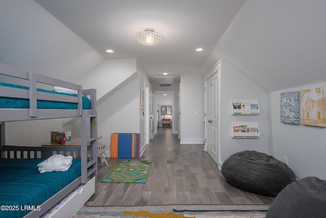123 Sandcastle Ct, Hilton Head Island, SC 29928 - bedroom featuring wood finished floors, vaulted ceiling, and recessed lighting