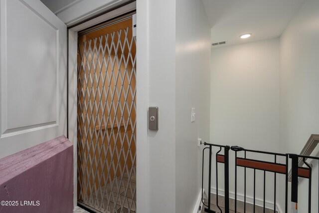 123 Sandcastle Ct, Hilton Head Island, SC 29928 - hallway featuring recessed lighting and elevator