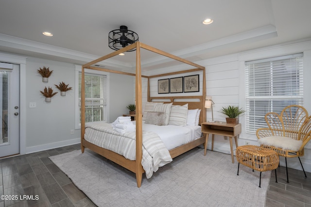 123 Sandcastle Ct, Hilton Head Island, SC 29928 - bedroom featuring a tray ceiling, wood finish floors, recessed lighting, and baseboards