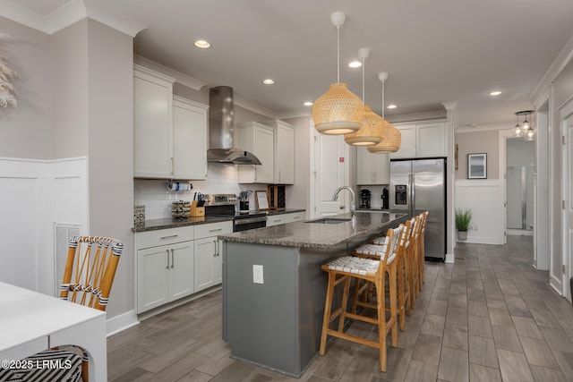 123 Sandcastle Ct, Hilton Head Island, SC 29928 - kitchen with wall chimney range hood, appliances with stainless steel finishes, ornamental molding, a sink, and backsplash