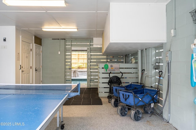 123 Sandcastle Ct, Hilton Head Island, SC 29928 - recreation room featuring concrete block wall