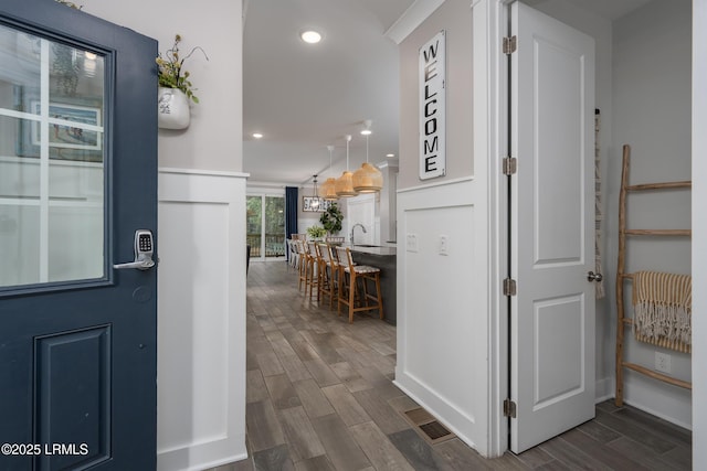 123 Sandcastle Ct, Hilton Head Island, SC 29928 - foyer with dark wood-type flooring and recessed lighting