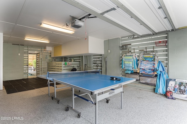 123 Sandcastle Ct, Hilton Head Island, SC 29928 - game room featuring a garage and speckle patterned floor