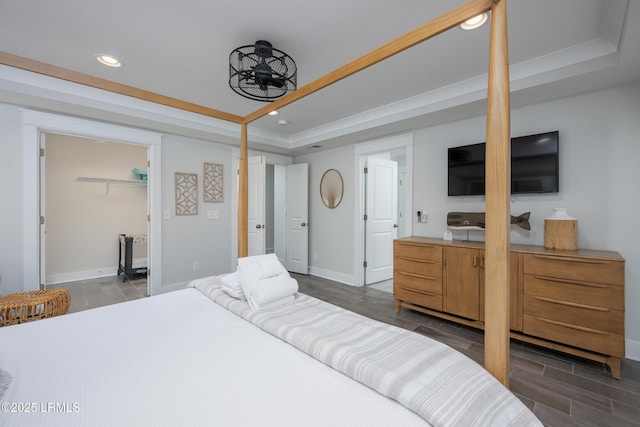 123 Sandcastle Ct, Hilton Head Island, SC 29928 - bedroom featuring a raised ceiling, dark wood-style floors, recessed lighting, and baseboards
