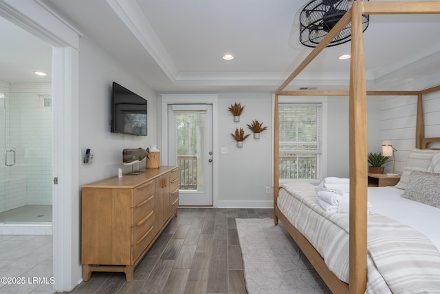 123 Sandcastle Ct, Hilton Head Island, SC 29928 - bedroom featuring multiple windows, wood tiled floors, access to outside, recessed lighting, and ensuite bathroom