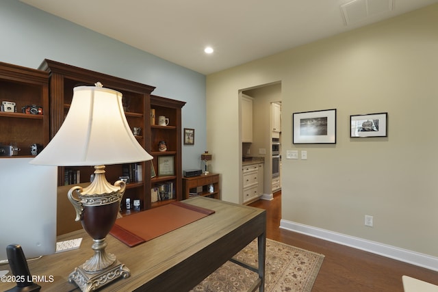 509 Nautical Ln, Okatie, SC 29909 - home office with dark wood-style floors, baseboards, and recessed lighting