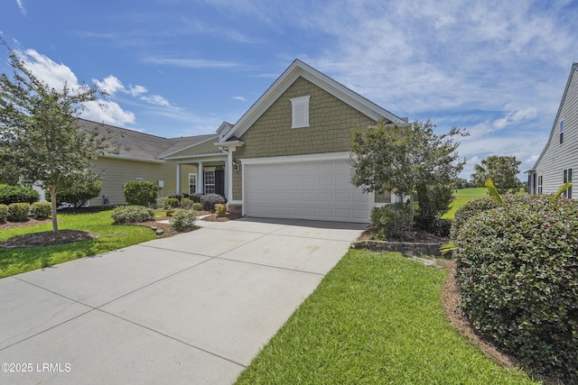 509 Nautical Ln, Okatie, SC 29909 - view of front of house with an attached garage, driveway, a front lawn, and stone siding