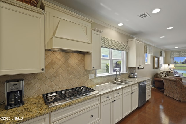 509 Nautical Ln, Okatie, SC 29909 - kitchen with a sink, custom exhaust hood, stainless steel appliances, open floor plan, and crown molding