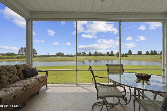 509 Nautical Ln, Okatie, SC 29909 - sunroom with tile patterned floors and a water view