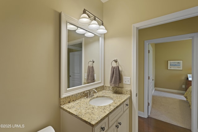 509 Nautical Ln, Okatie, SC 29909 - bathroom with vanity, wood finished floors, toilet, and baseboards