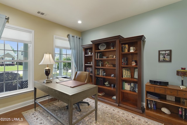 509 Nautical Ln, Okatie, SC 29909 - home office with wood finished floors, baseboards, and recessed lighting