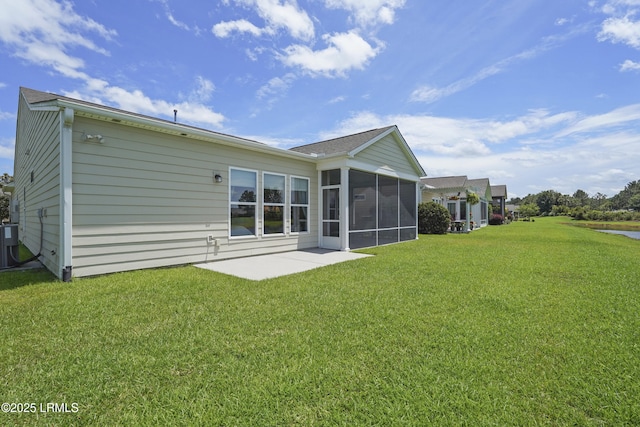 509 Nautical Ln, Okatie, SC 29909 - rear view of house featuring a yard, a sunroom, and a patio area