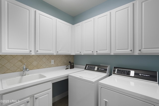 509 Nautical Ln, Okatie, SC 29909 - laundry area featuring cabinet space and washing machine and dryer
