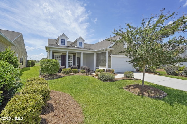 509 Nautical Ln, Okatie, SC 29909 - view of front of home with driveway, a front yard, an attached garage, and a porch