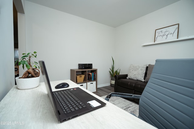 bedroom with hardwood / wood-style flooring