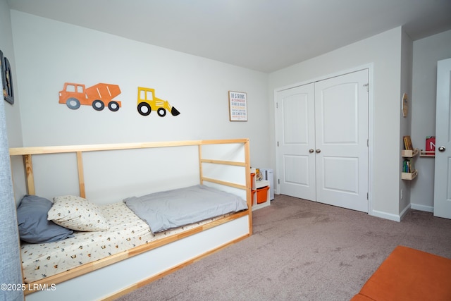 bedroom with a closet and carpet