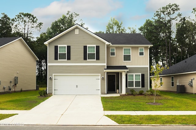 view of front facade featuring a garage, cooling unit, and a front lawn