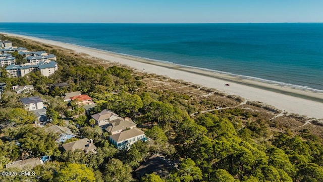 aerial view featuring a view of the beach and a water view