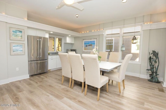 dining room featuring light hardwood / wood-style flooring