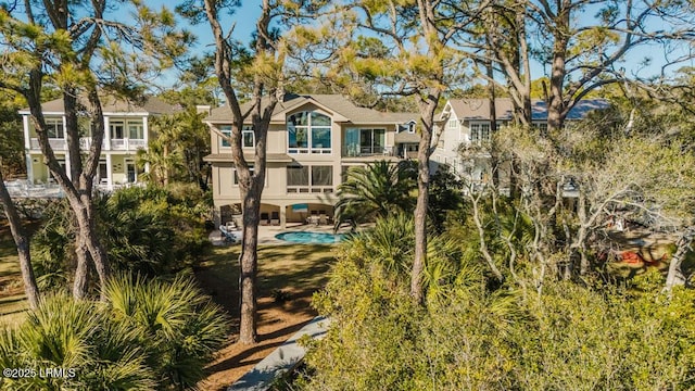 rear view of property with a patio