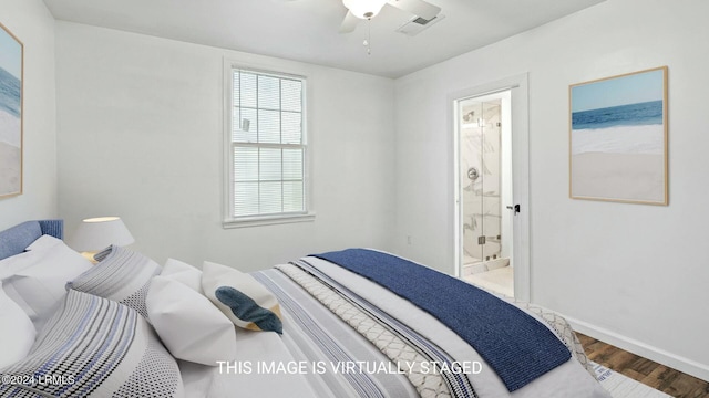 bedroom featuring connected bathroom, hardwood / wood-style flooring, and ceiling fan