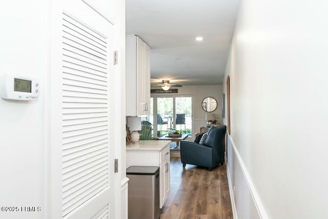 hall featuring recessed lighting and wood finished floors