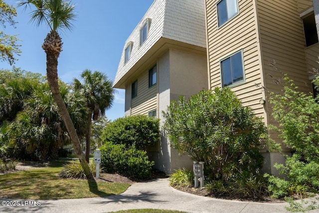 view of property exterior with stucco siding