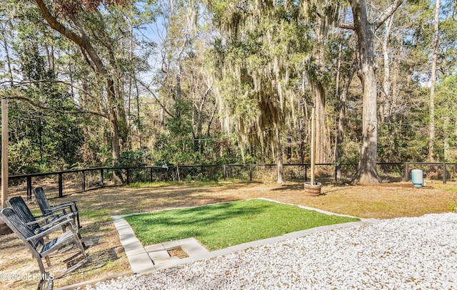 view of yard with fence