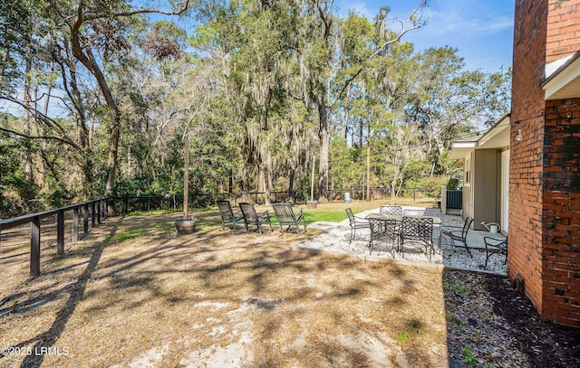 view of yard featuring a fenced backyard and a patio