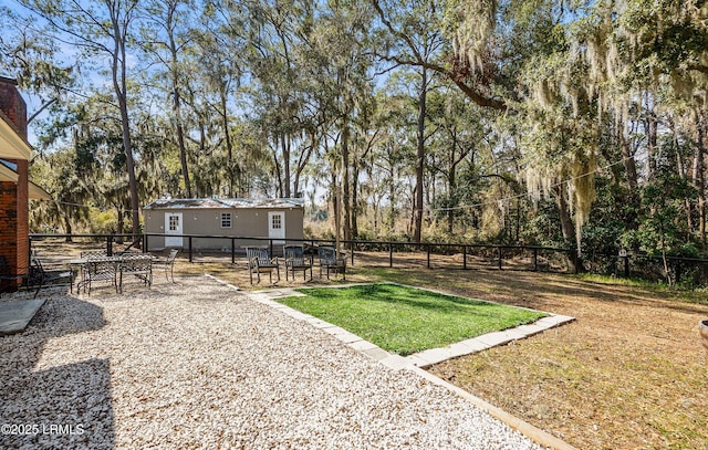 view of yard featuring a fenced backyard and a patio