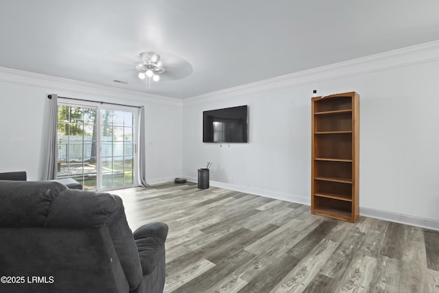 22 Sandy Pointe Dr, Bluffton, SC 29910 - living room with a ceiling fan, ornamental molding, wood finished floors, and baseboards