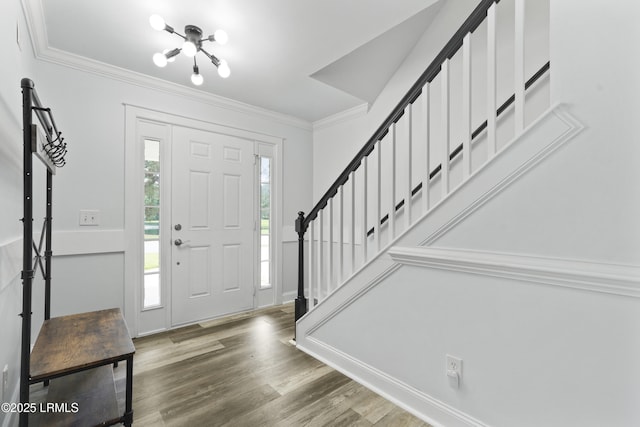 22 Sandy Pointe Dr, Bluffton, SC 29910 - entrance foyer with stairway, ornamental molding, wood finished floors, and a chandelier