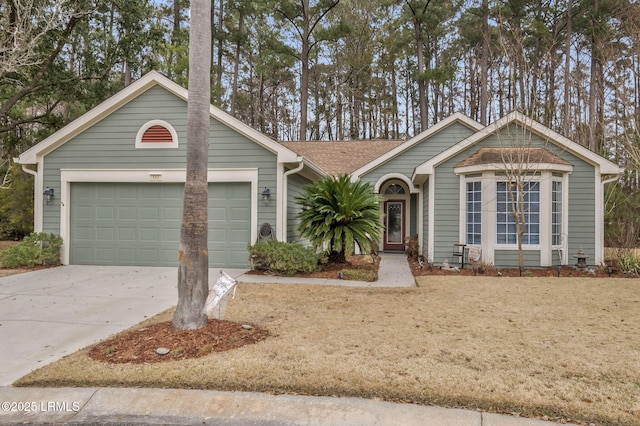 ranch-style house featuring a garage