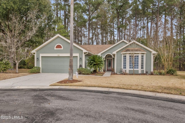 ranch-style house featuring a garage