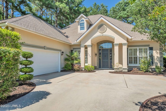 view of front of home featuring a garage